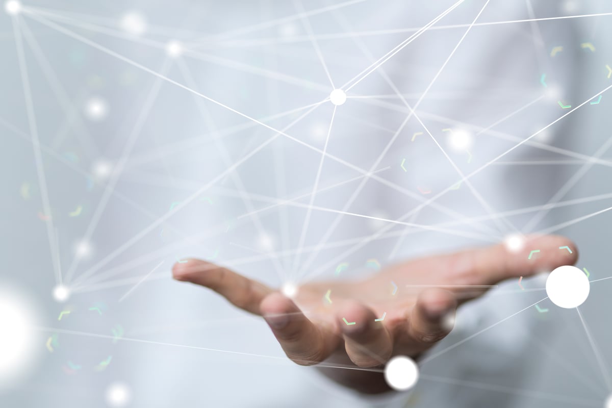 man-holding-cyber-lines-white-background