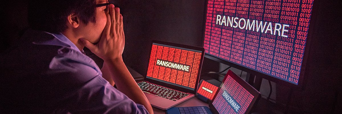 ransomware_attack_red_screen_worried_security_professional